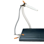 Groomers Third Arm,"Flexible dryer hose clipped to table edge"