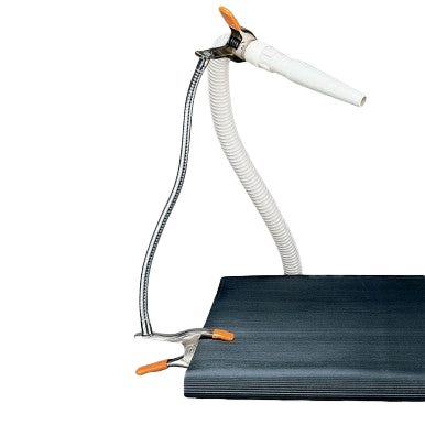 Groomers Third Arm,"Flexible dryer hose clipped to table edge"