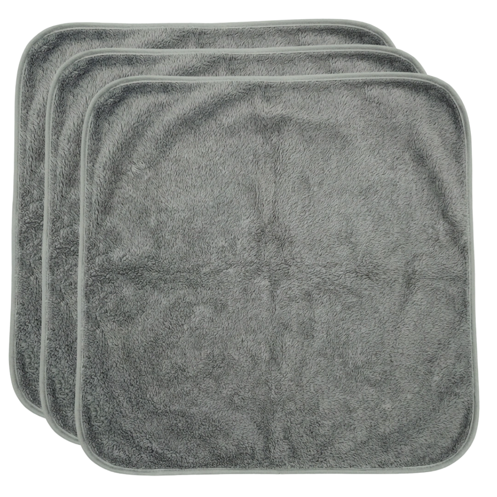 Puppywarmer Fleece Inserts,"Stack of three gray fleece pad inserts"