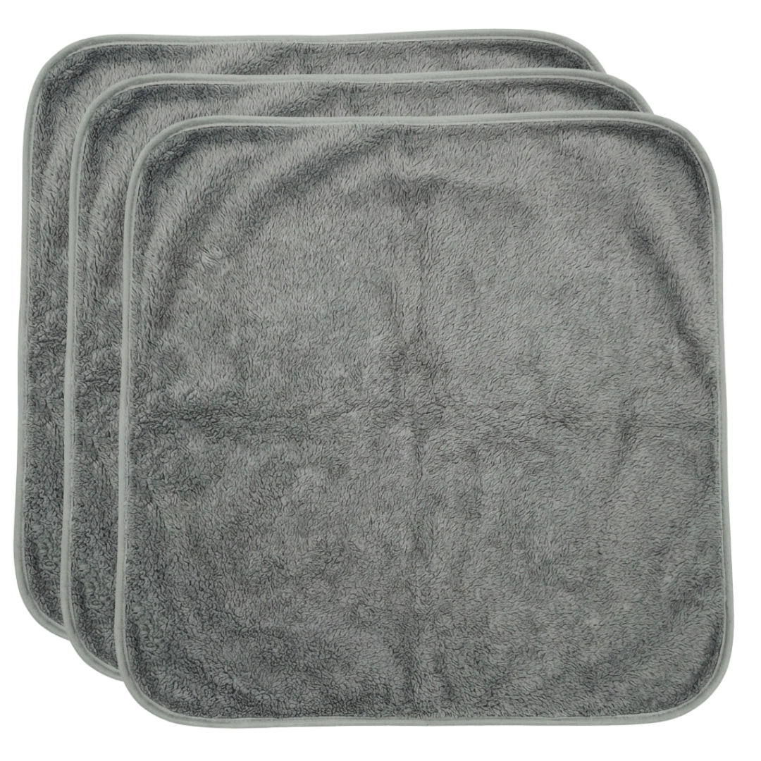 Puppywarmer Fleece Inserts,"Stack of three gray fleece pad inserts"