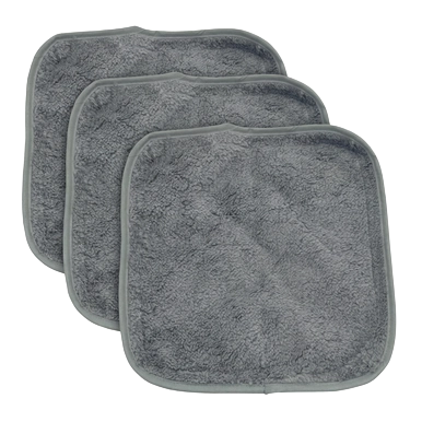 Puppywarmer Fleece Inserts,"Three stacked gray fleece pad inserts"