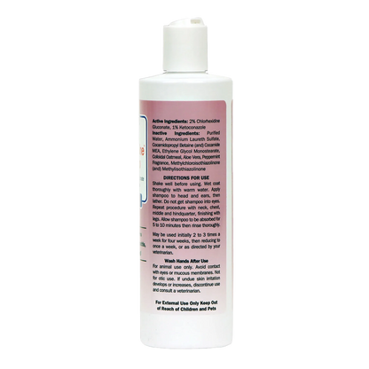 Ketohexidine Shampoo,"White shampoo bottle with flip-top cap, side label view"