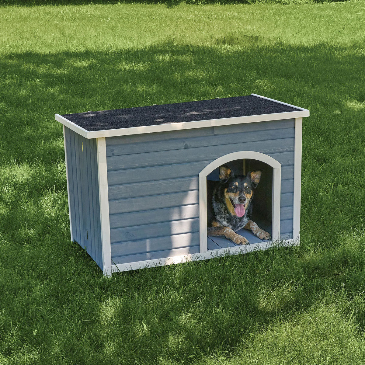 Eilio™ Folding Wood Dog Home,"Gray wooden dog house with arched doorway and dog inside"