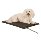 Lectro-Kennel® Heated Pad & Cover,"White dog lying on black heated pad with cord"