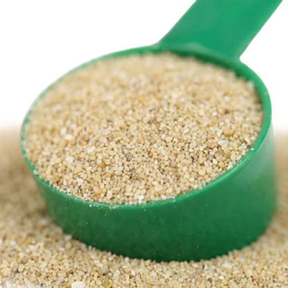 Summer Eczema,"Green scoop filled with fine beige granules"