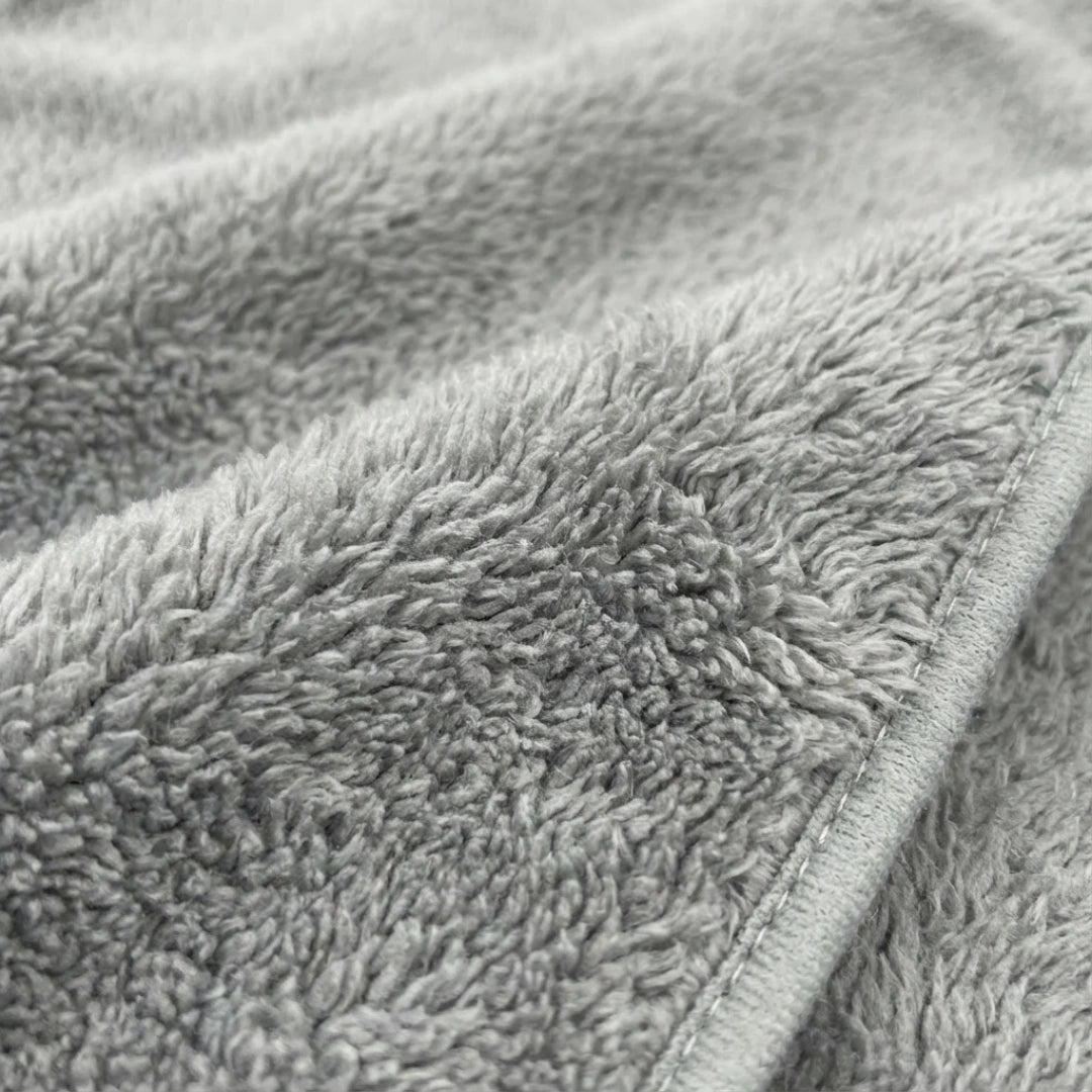 Puppywarmer Fleece Inserts,"Gray fleece fabric close-up with stitched edge"
