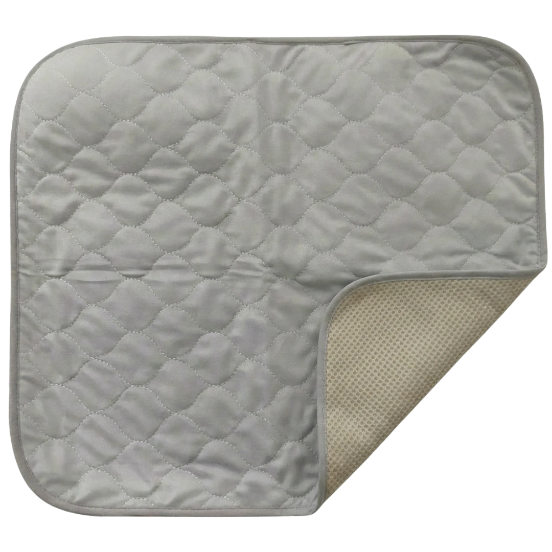 Puppywarmer Incubator Pee Pad,"Quilted rectangular pee pad with corner folded up"