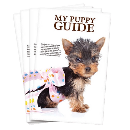 My Puppy Guide Booklet,"Stack of puppy guide booklets with puppy photo on cover"