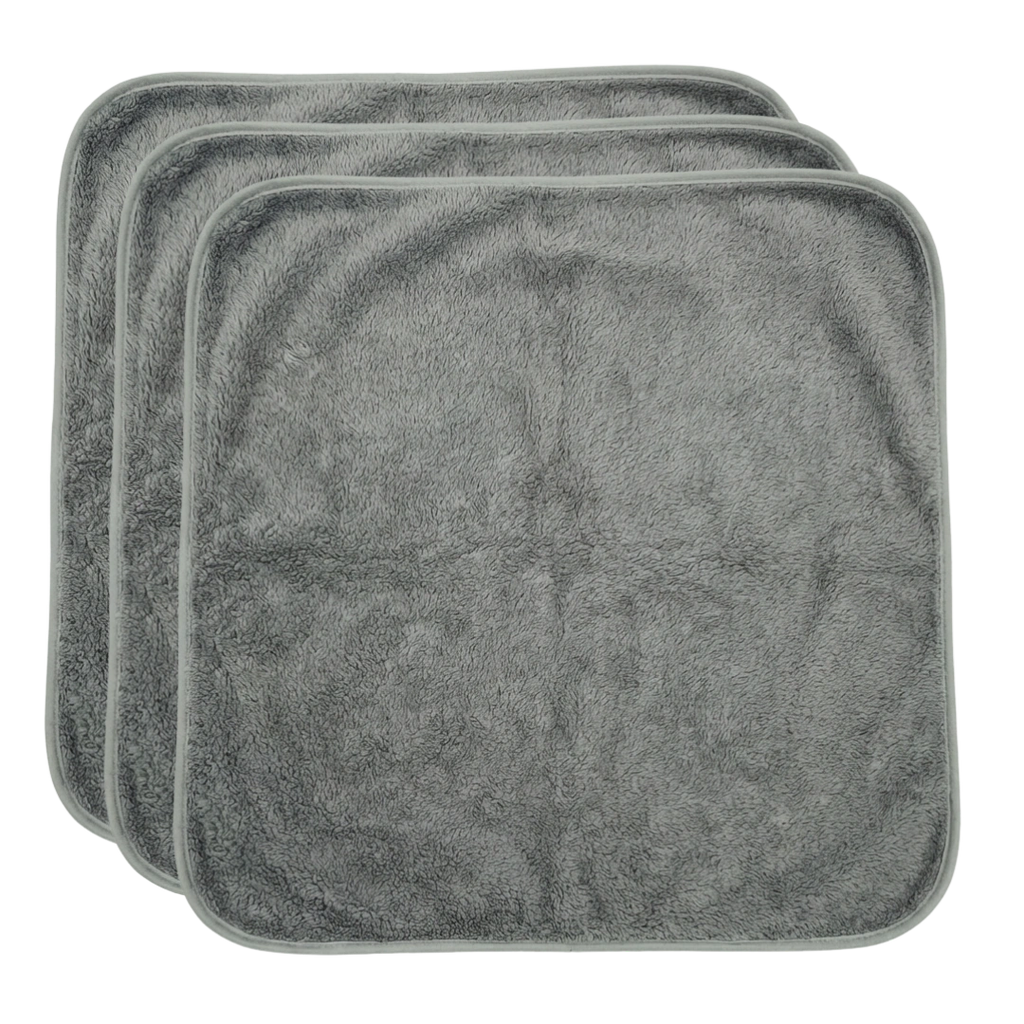 Puppywarmer Fleece Inserts,"Stack of three gray fleece pad inserts"