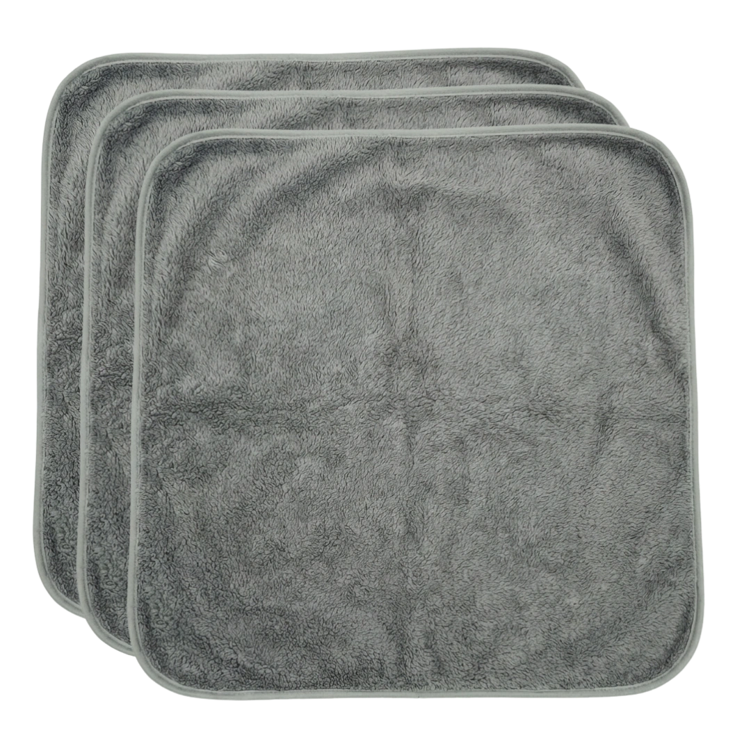 Puppywarmer Fleece Inserts,"Stack of three gray fleece pad inserts"