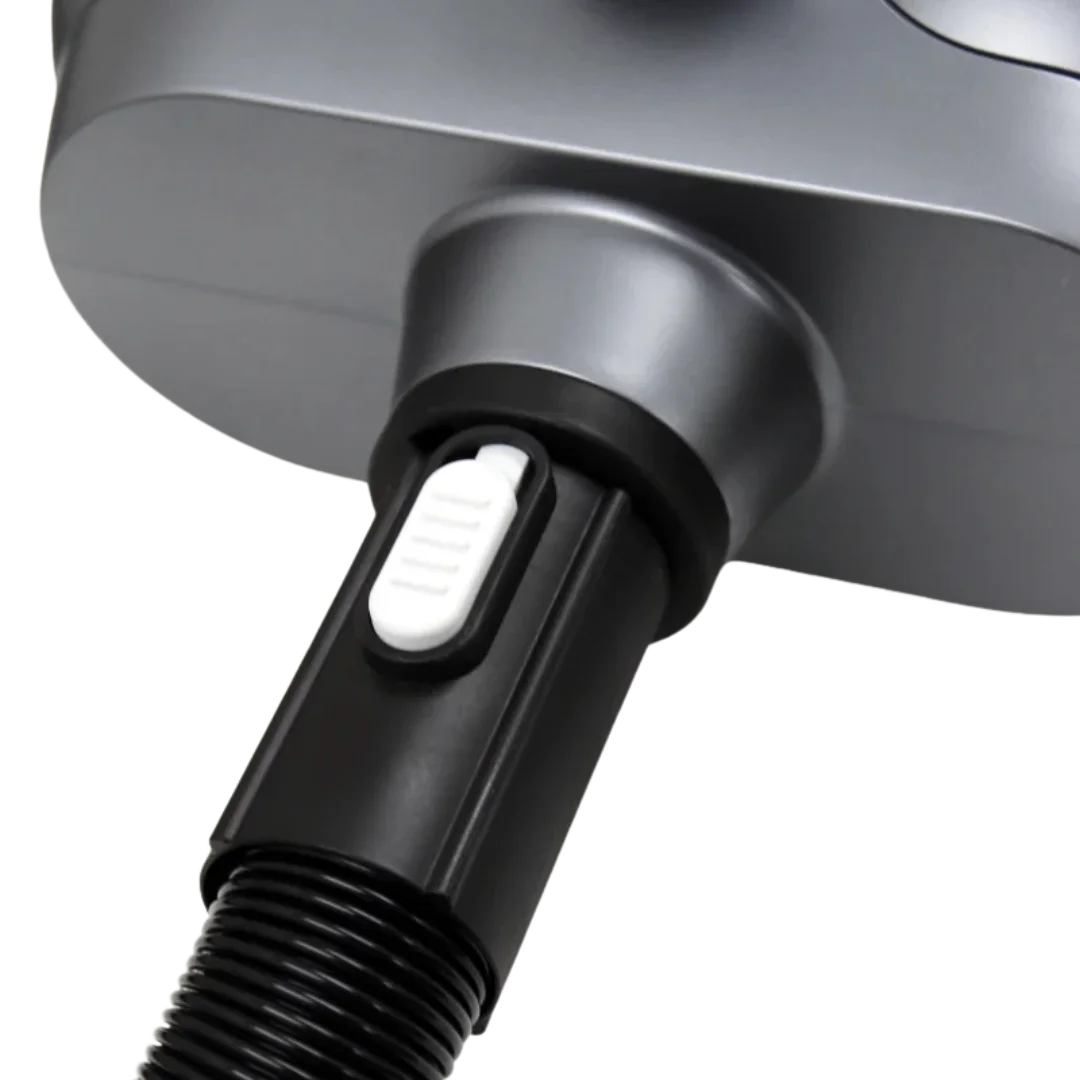 Duo-Surge Max Power & Airflow Dryer by Waggz,"Close-up of hose connection with white release button"