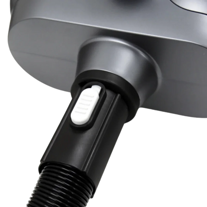 Duo-Surge Max Power & Airflow Dryer by Waggz,"Close-up of hose connection with white release button"