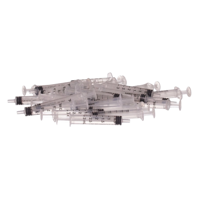 Small Syringes without Needles,"Pile of clear 3 mL syringes without needles"