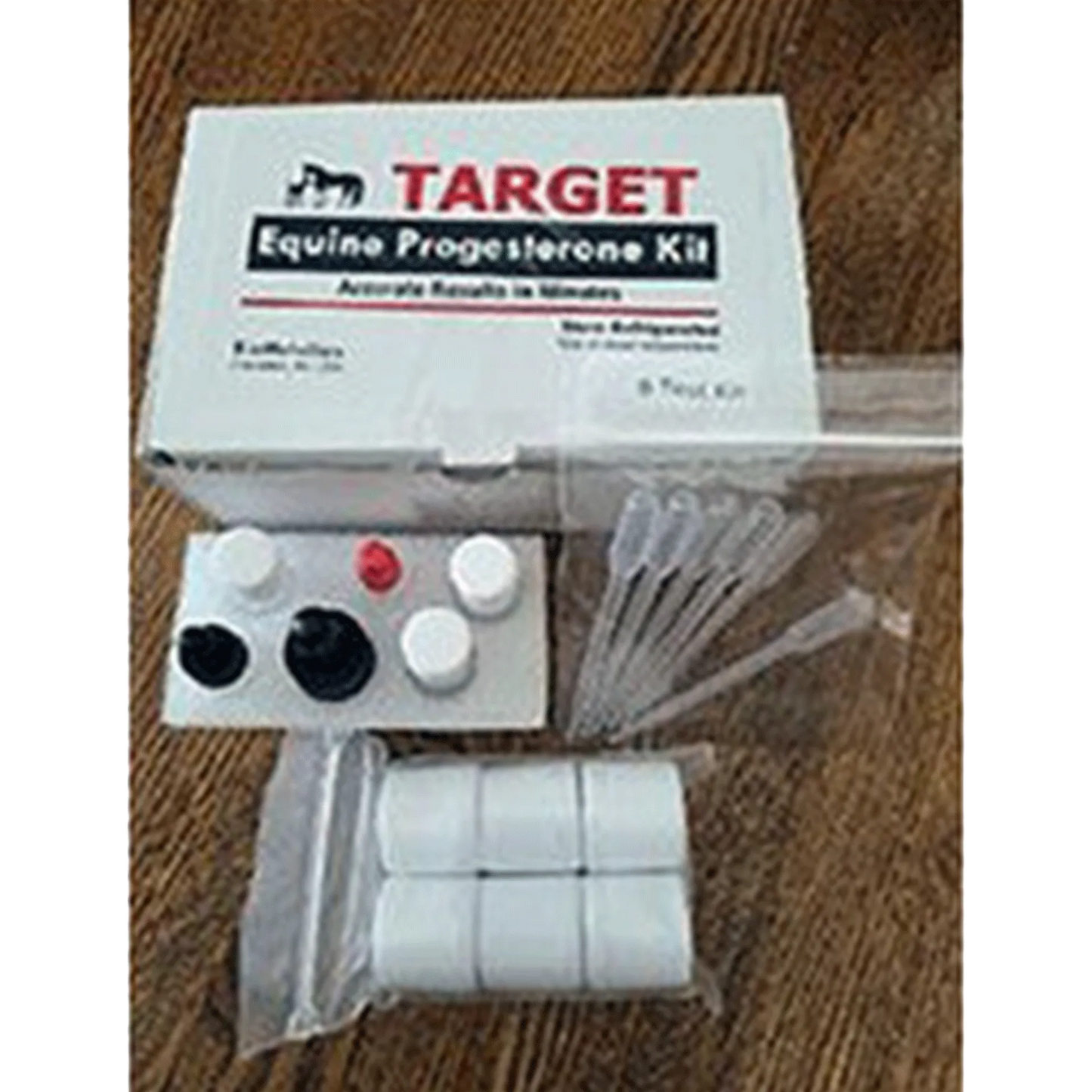 Equine Progesterone Test,"Test kit box with pipettes, reagent bottles, and pad tray"
