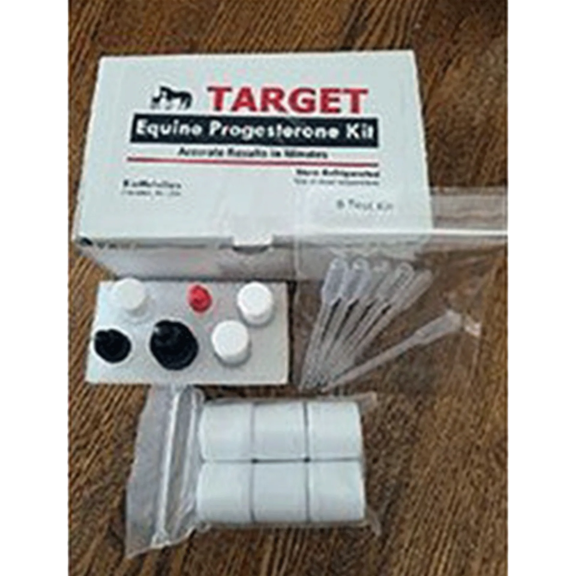 Equine Progesterone Test,"Test kit box with pipettes, reagent bottles, and pad tray"