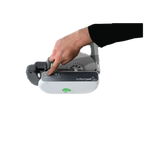 BrilliantPad Pro,"Hand pressing button on open pad dispenser"
