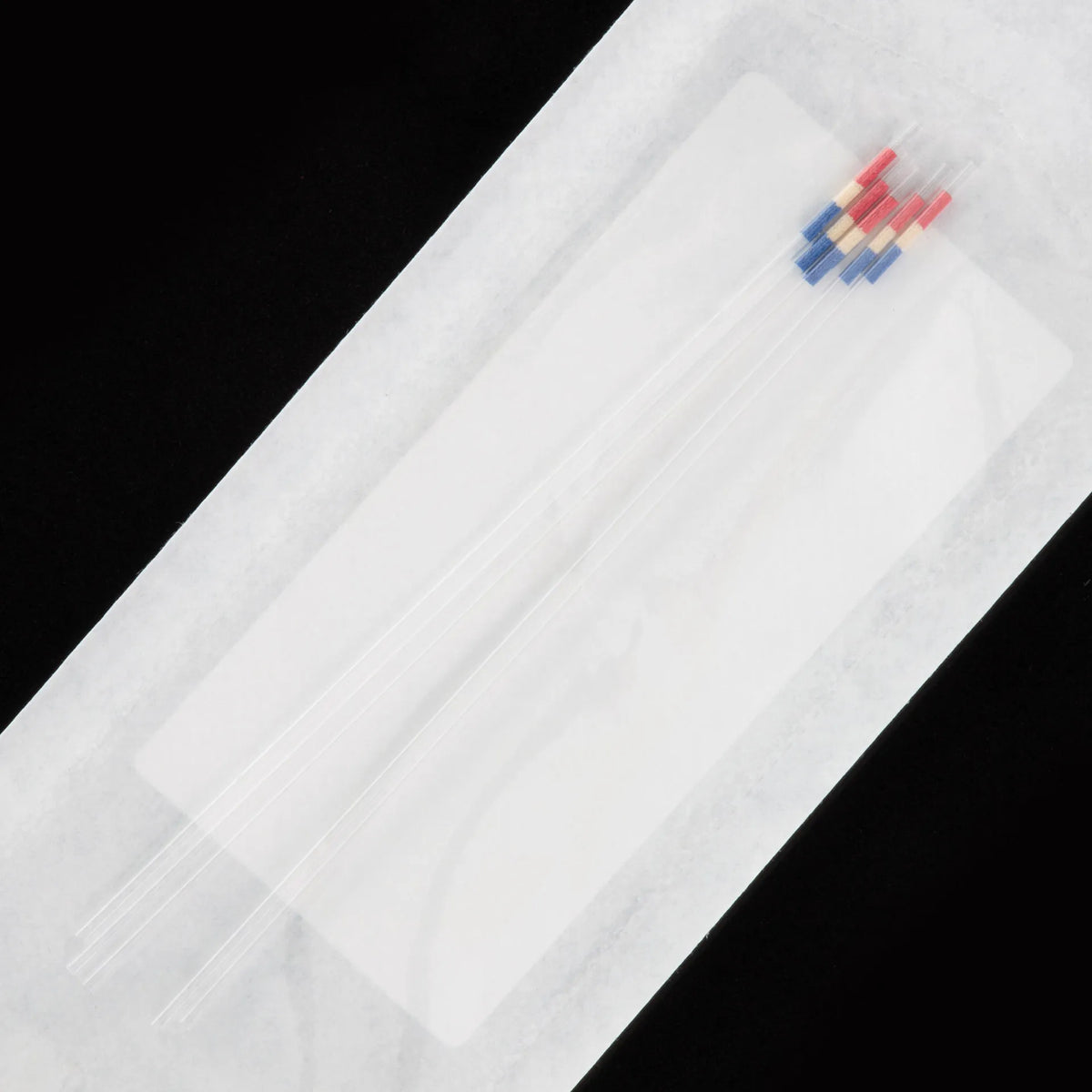IMV CRISTAL .25CC RADIATED STRAW,"Bundle of clear straws with red and blue plugs"