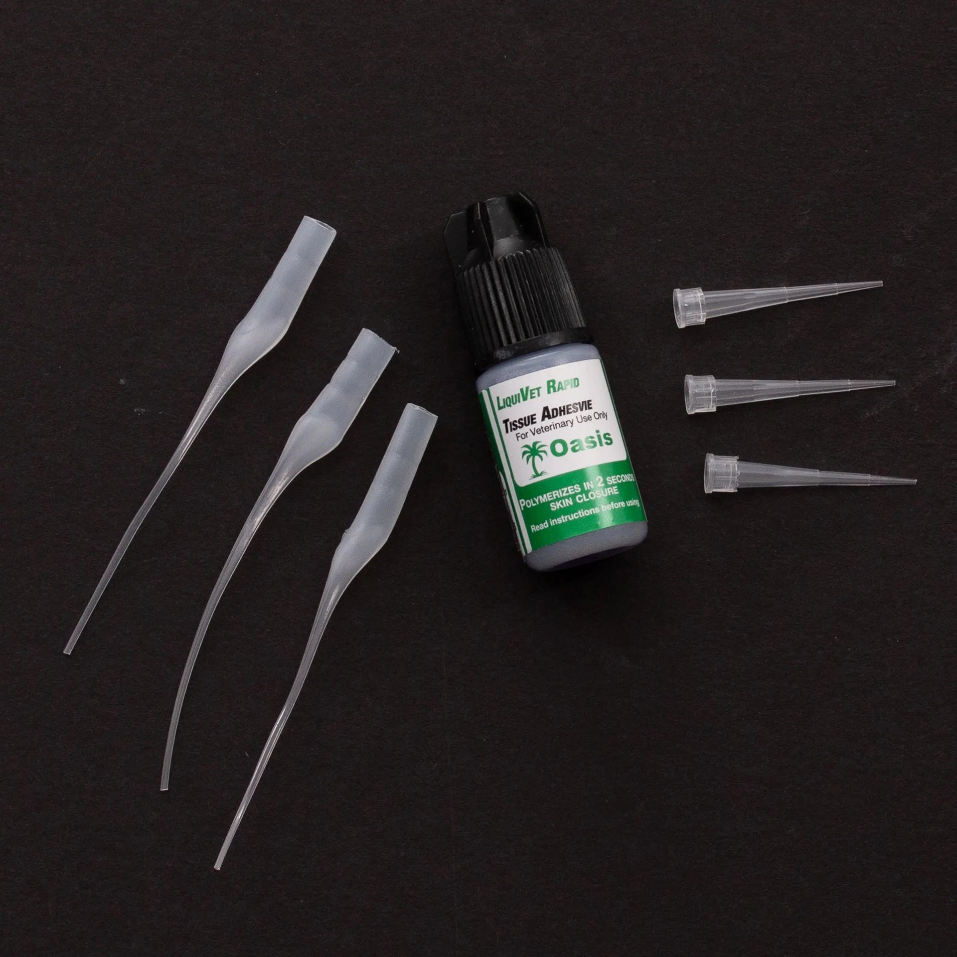 LiquiVet Rapid Tissue Adhesive,"Adhesive bottle with black cap and six clear applicator tips"