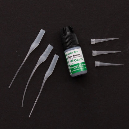 LiquiVet Rapid Tissue Adhesive,"Adhesive bottle with black cap and six clear applicator tips"