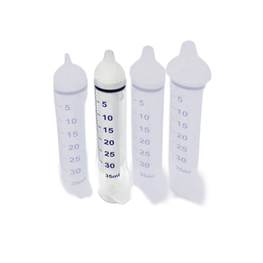 Puppywamer Latchons Syringe Nipple Feeders,"Four feeding syringes with white rubber nipple tips"