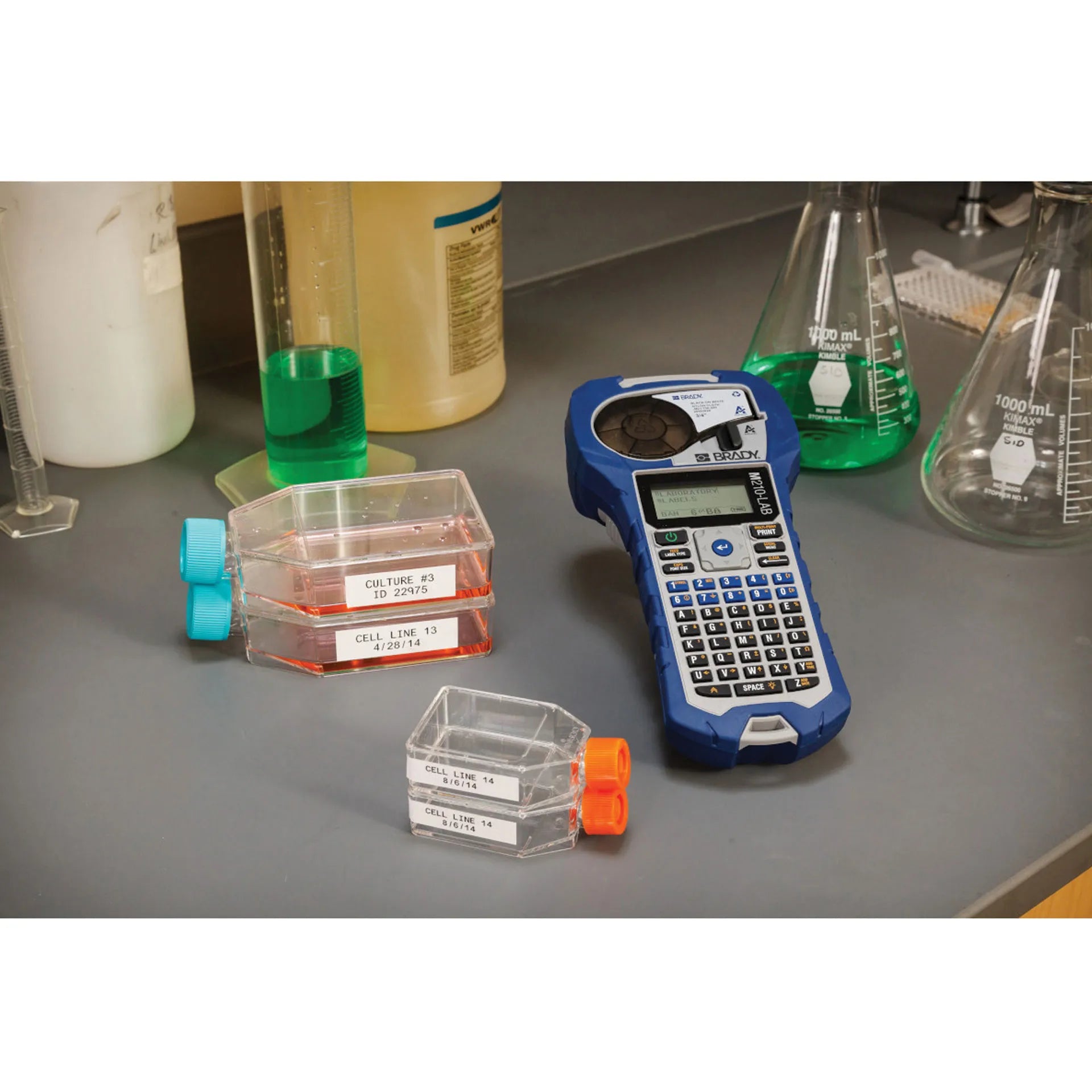 Lab Label Printer and Self-Laminating Cryogenic Polyester Labels,"Blue handheld label printer with labeled lab containers"