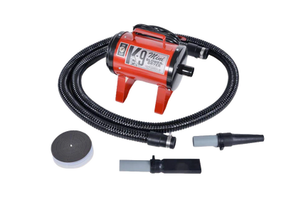 Mini K-9 Dog Dryer,"Red blower dryer with flexible hose and nozzle attachments"