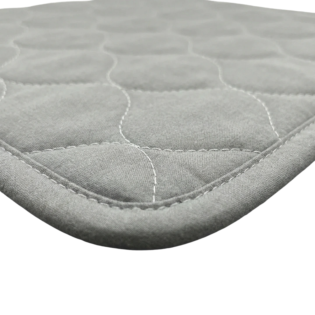 Puppywarmer Whelping Box Pad,"Quilted gray pad with rounded corners and stitched edge"